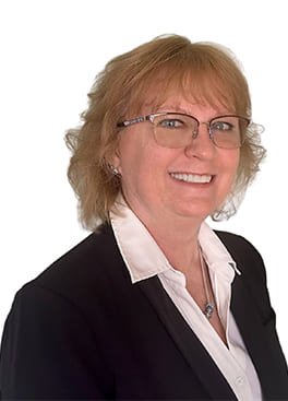 A photograph of Shari Jahn, Senior Contracts Manager of PCI-GS